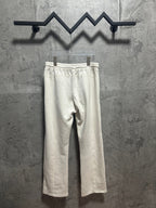 Ralph Lauren light white sweatpants on hanger with elastic waistband and straight hem