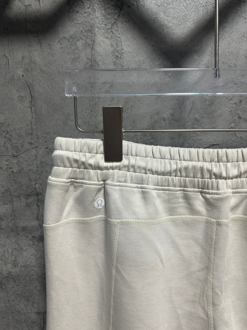 Ralph Lauren white sweatpants close-up of elastic waistband and stitched front