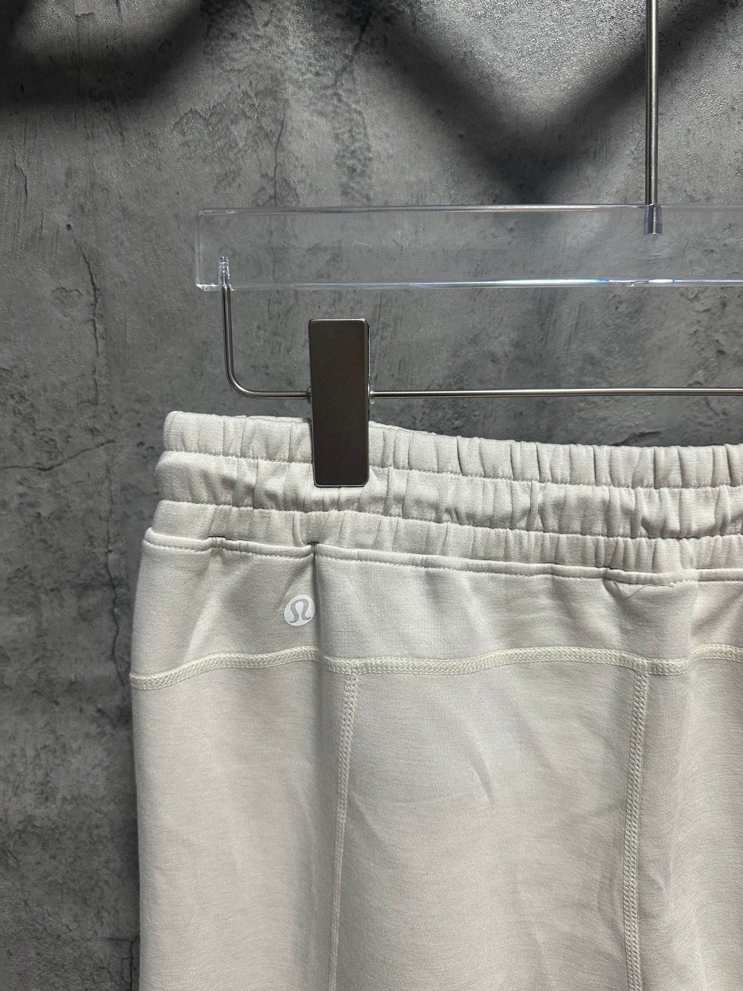 Ralph Lauren white sweatpants close-up of elastic waistband and stitched front