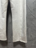 Ralph Lauren white sweatpants leg with smooth fabric and draped side seam