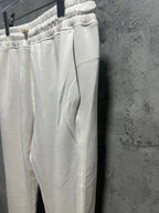 Ralph Lauren white sweatpants side view with elastic waistband and curved pocket seam