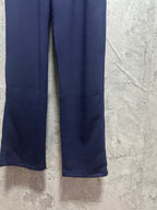 Navy wide-leg pants with straight hems and stitched side seams