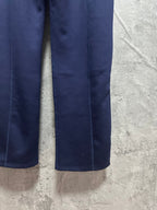 Navy pants leg with stitched seam and straight hem