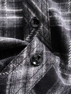 Fendi plaid shirt close-up, black buttons at collar and front