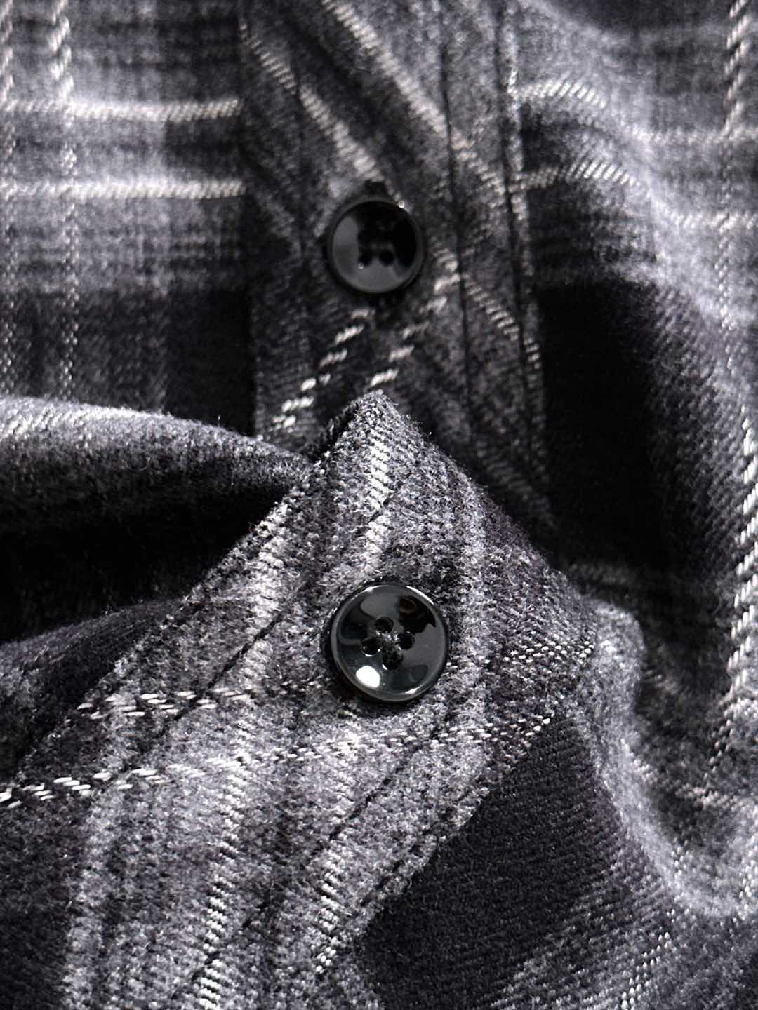 Fendi plaid shirt close-up, black buttons at collar and front