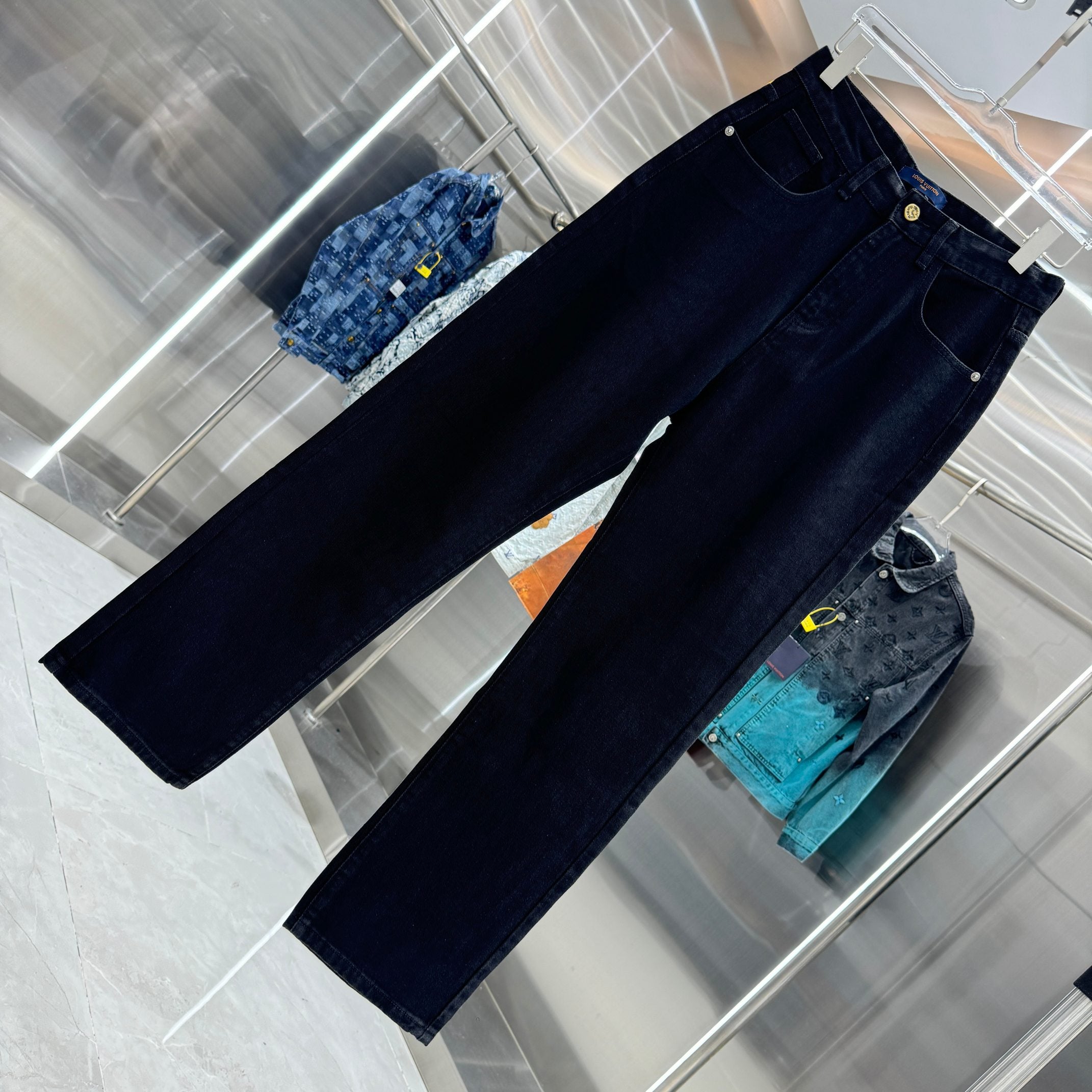 Dark blue denim jeans full-length view with straight, relaxed leg