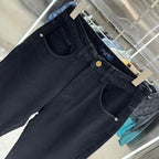 Dark blue denim jeans with front pockets and stitched waistband