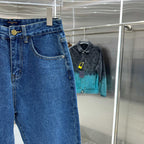 Blue denim Louis Vuitton pants side view, stitched pockets and gold button