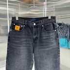 Dark denim jeans with LV-logo patch and four-pocket design