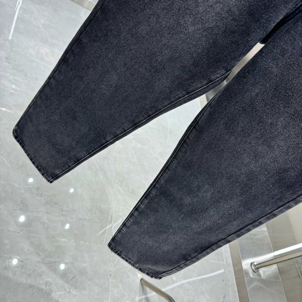 Dark denim jeans with straight legs and hem detail