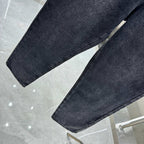 Dark denim jeans with straight legs and hem detail