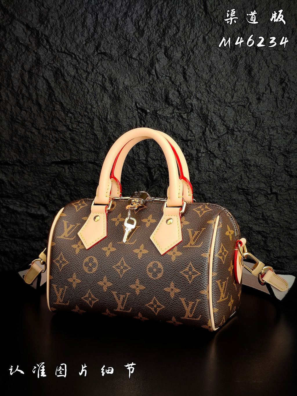 Louis Vuitton monogram handbag angled view with tan handles and dangling strap details