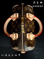 Louis Vuitton monogram handbag close-up top view with zipper and internal strap tabs