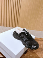 Black unisex sneakers with white sherpa collar, lace-up, side profile