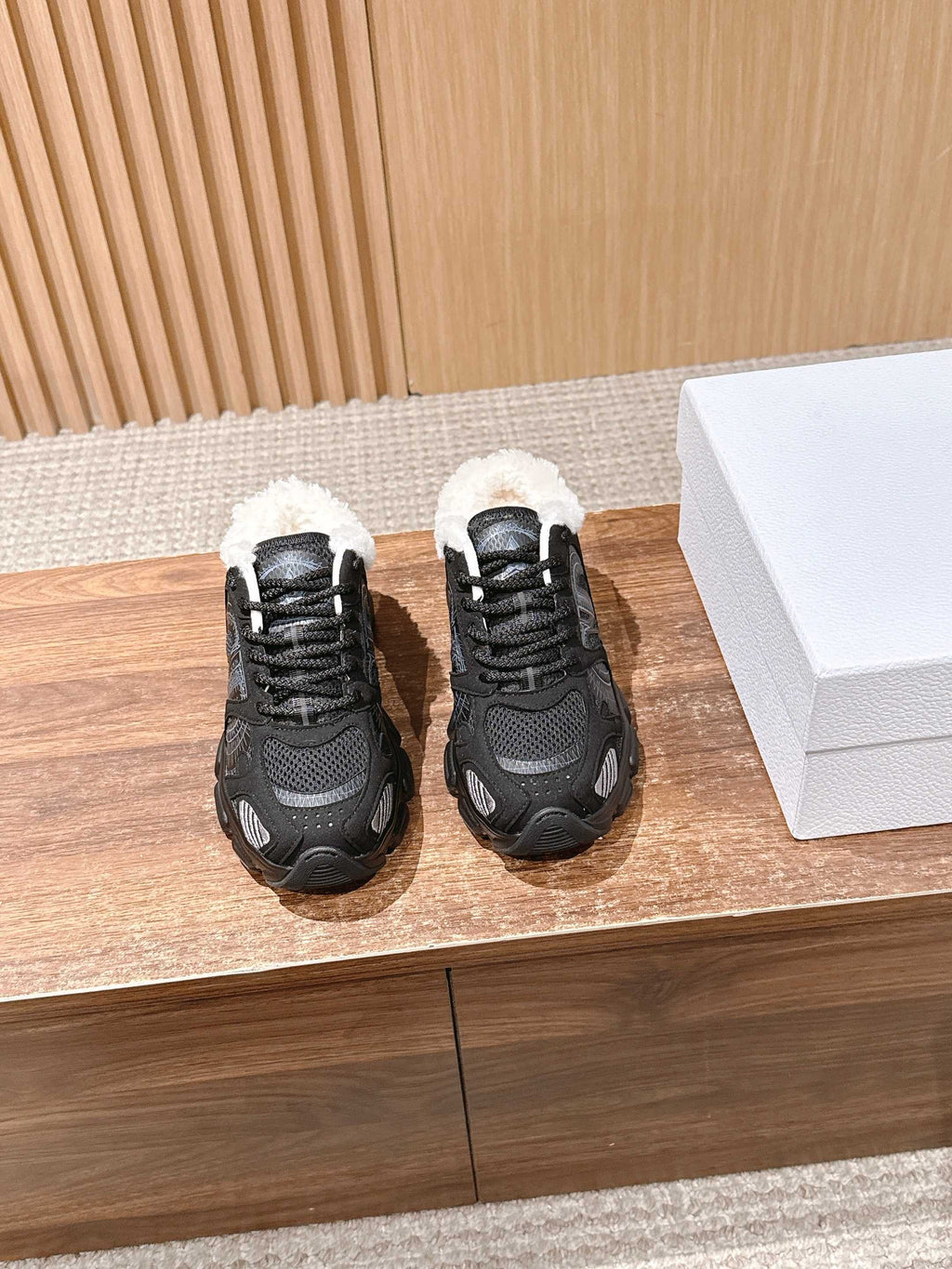 Black unisex sneakers with white sherpa collar, lace-up, chunky sole