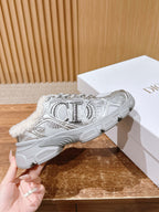 Metallic silver sneaker with white sherpa collar and star graphic on the side.