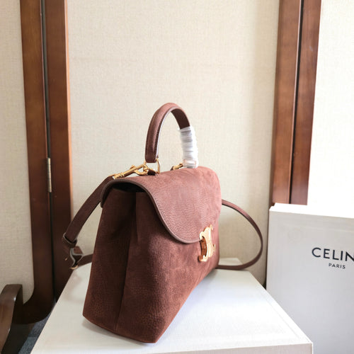 Celine handbag with flap and gold logo clasp, dark brown side view with adjustable strap
