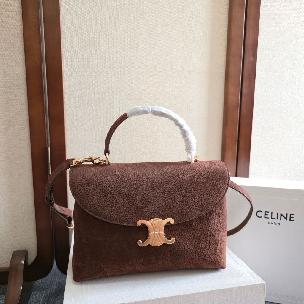 Celine handbag in dark brown textured leather with top handle, flap, and gold logo clasp