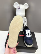 Prada unisex sneaker outsole, cream tread with navy upper and white laces