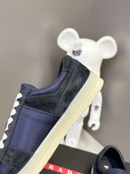 Prada unisex suede sneakers, navy colorblock panel with white laces and cream sole
