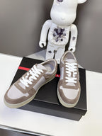 Taupe and white lace-up sneakers with chunky light sole, side and front view