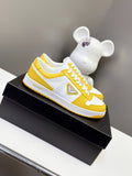 Prada unisex sneakers, yellow and white leather, lace-up with rubber sole