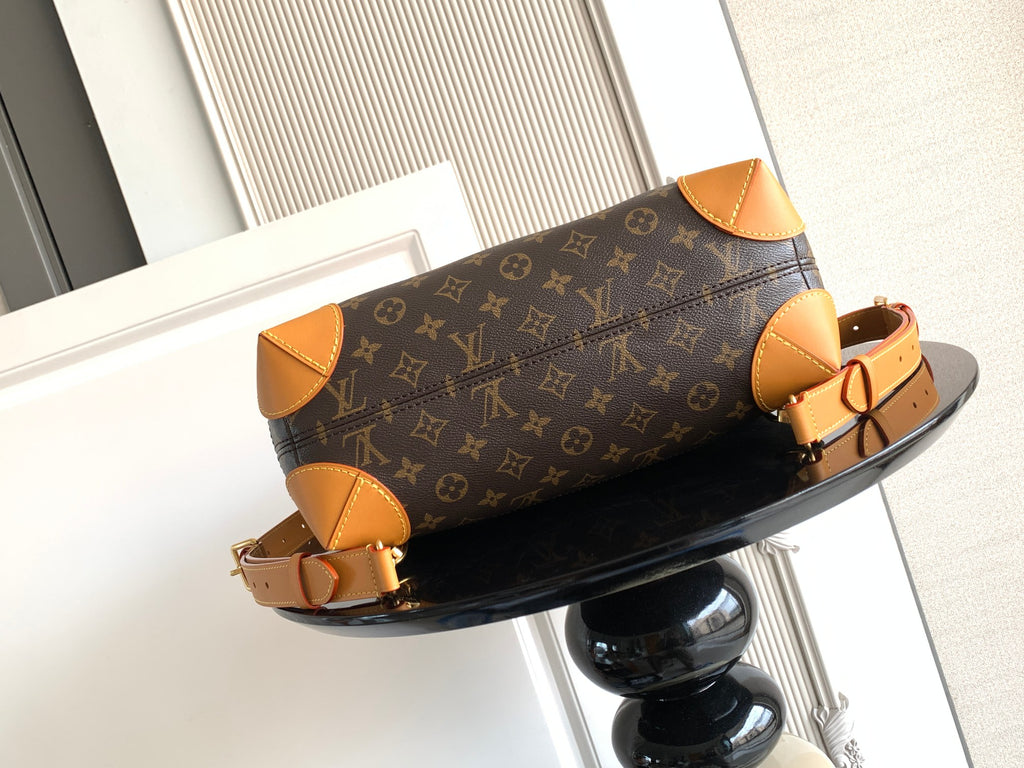 Louis Vuitton men's long tote bag with tan handle straps and gold-tone buckle closures