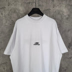 White Balenciaga T-shirt front view with small chest logo, crew neck, short sleeves