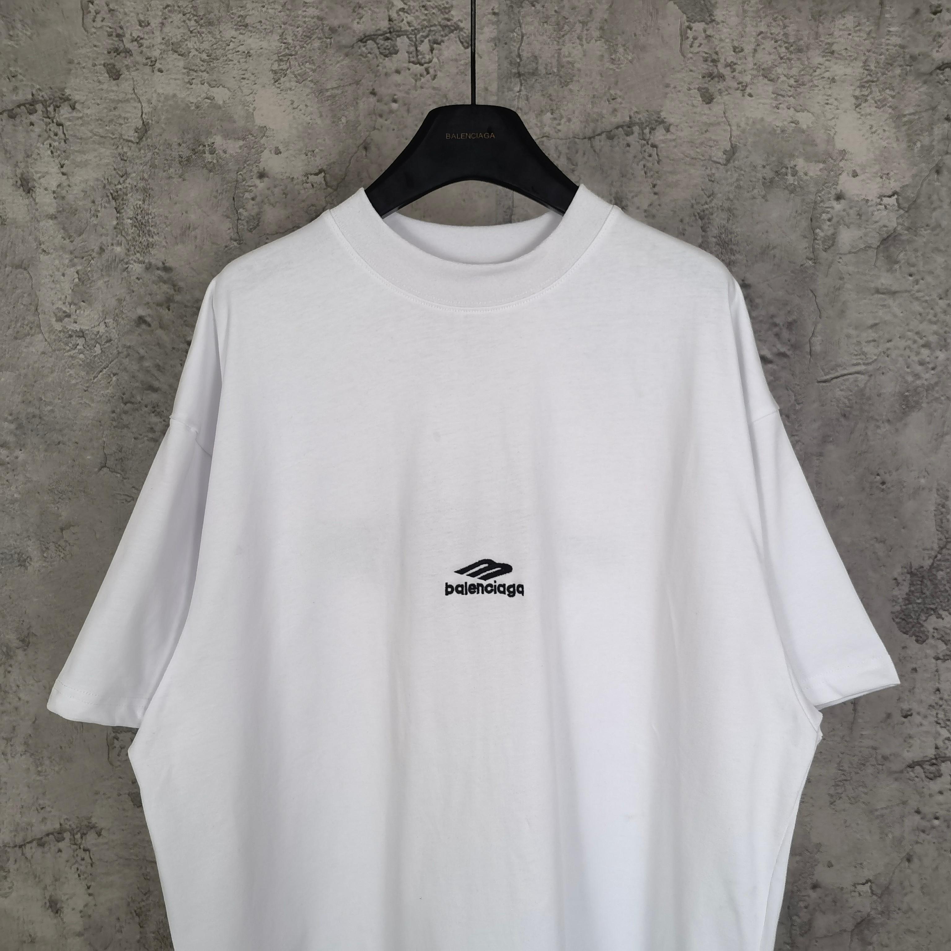 White Balenciaga T-shirt front view with small chest logo, crew neck, short sleeves