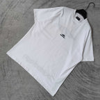 White Balenciaga short-sleeve T-shirt folded flat, crew neck, small chest logo