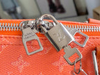 Louis Vuitton orange monogram bag zipper pulls with metal locks and hardware