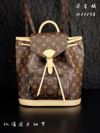 Louis Vuitton monogram canvas mini backpack with cream trim, top handle, and drawstring
