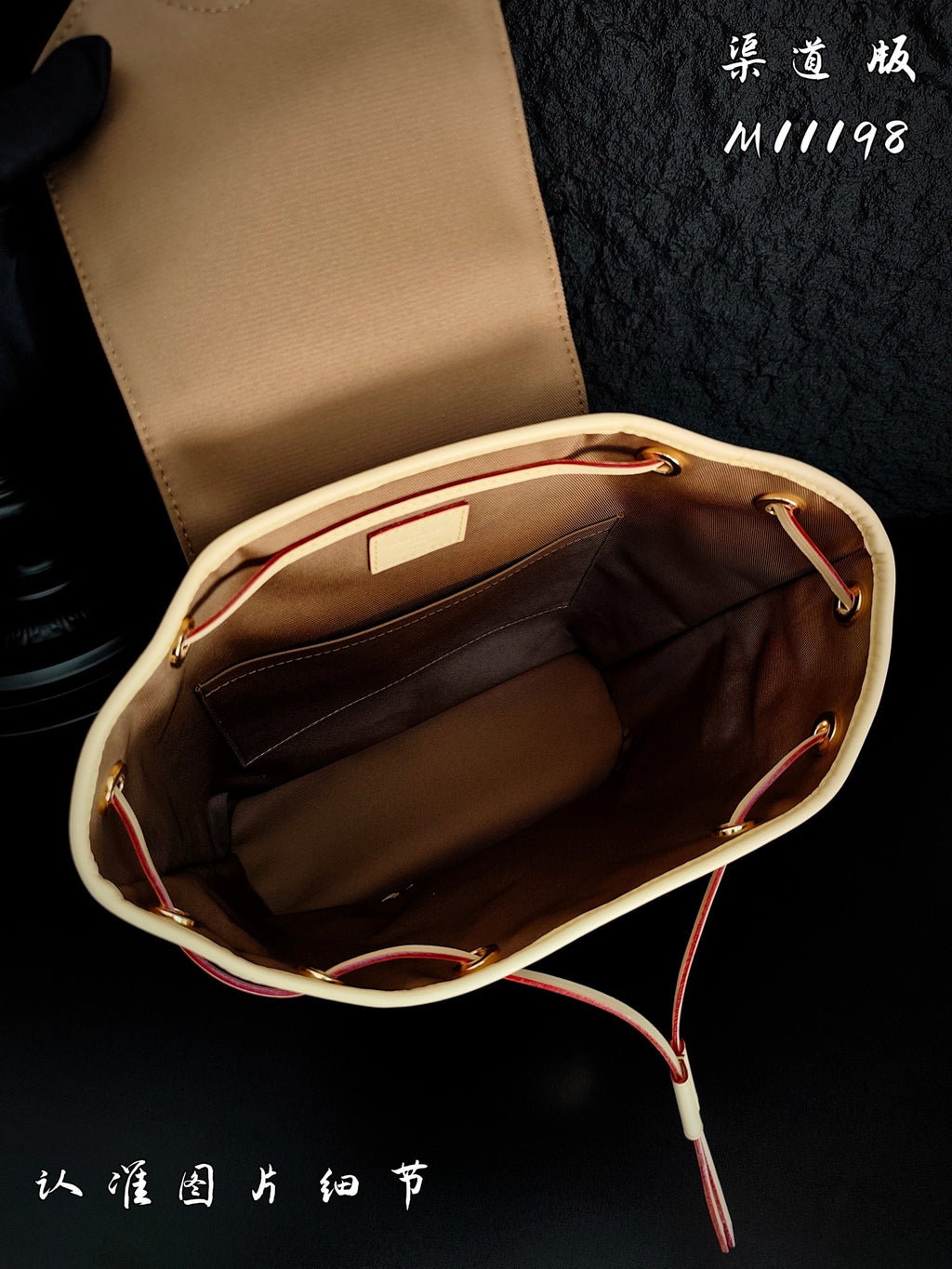 Louis Vuitton monogram mini bag interior view with tan lining and open top