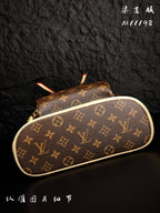 Louis Vuitton monogram canvas zip pouch with cream trim and gold-tone zipper