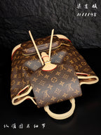 Louis Vuitton monogram canvas mini backpack top view with drawstring cords and gold hardware