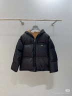 Prada hooded puffer jacket, black, full-zip front, front logo patch.