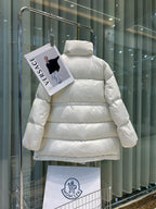 White Moncler puffer jacket, hooded back view, quilted horizontal baffles
