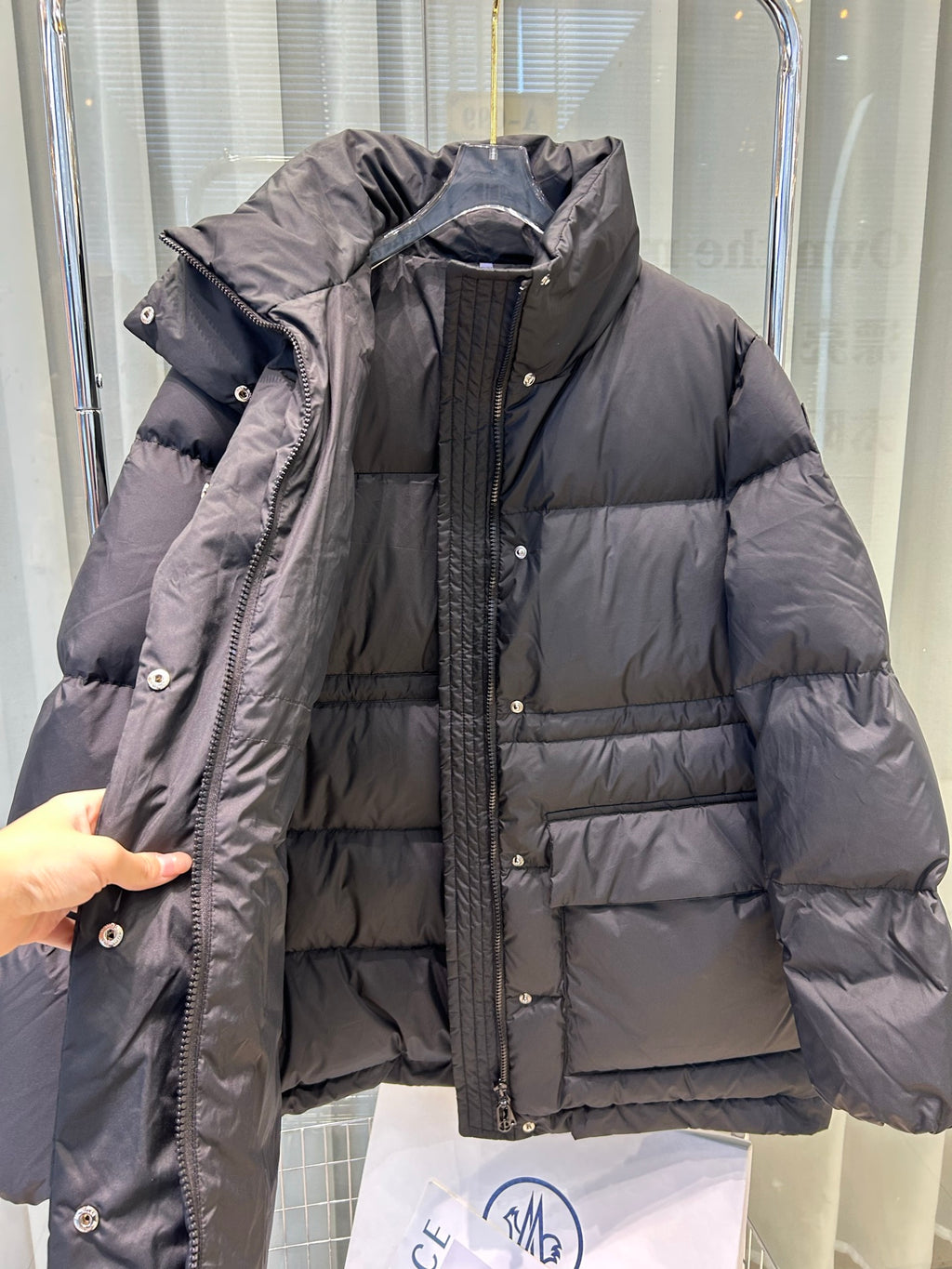 Dark gray Moncler hooded puffer parka, zip front, quilted horizontal baffles