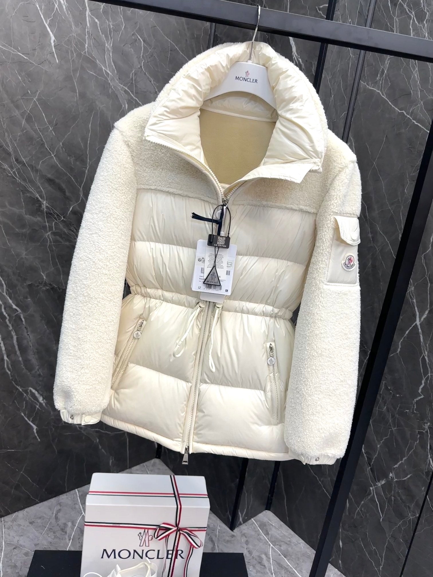 Cream hooded long puffer jacket with full zip, drawstring waist detail and side pockets