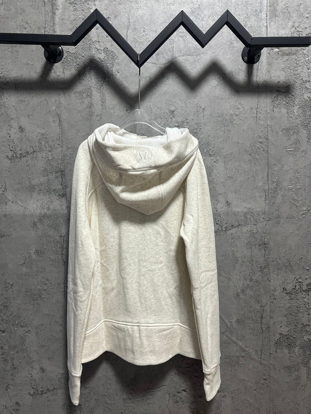 Cream zip-up hoodie with hood, rear view