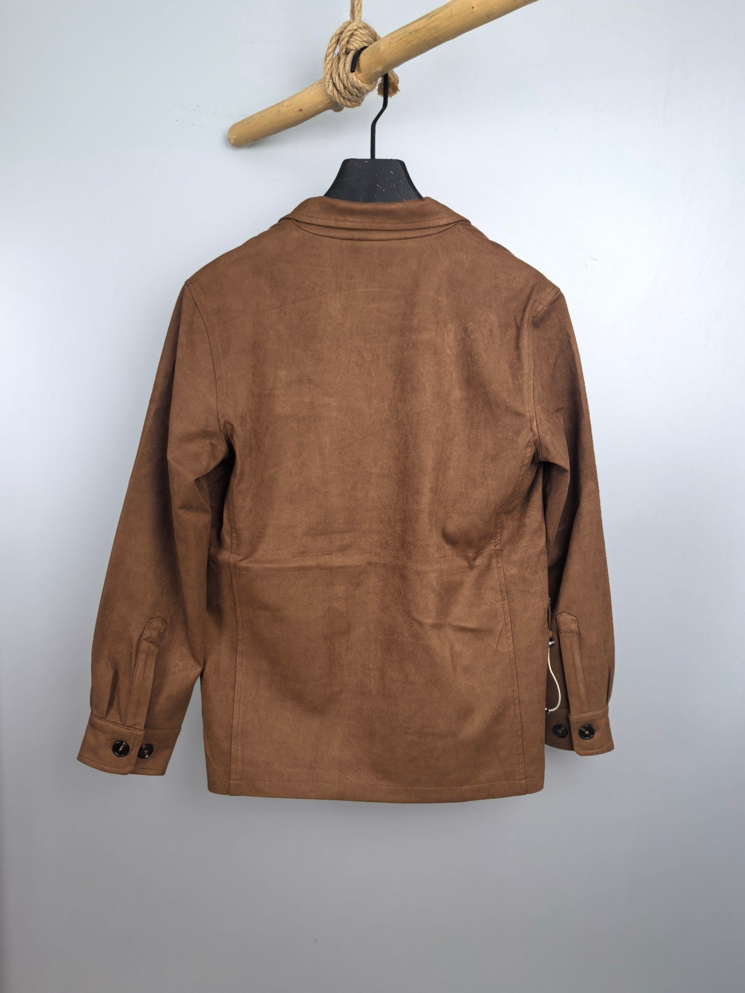 Brown suede-style jacket back view with patch pockets and button cuffs