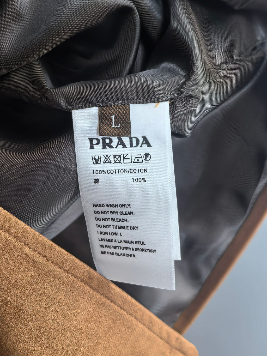 Prada cotton lining care label inside jacket