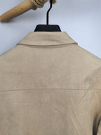 Tan jacket back with stand collar and center seam line