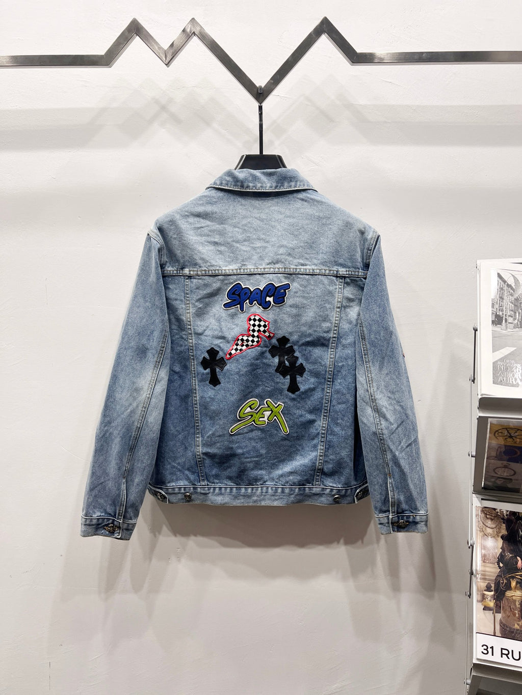 Light-wash denim jacket with back graphic patches, button-front, flap chest pockets