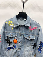 Light-wash denim jacket with embroidered patch details on chest and shoulders
