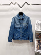 Light blue denim jacket with monogram pattern, button-front and chest pockets