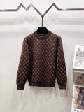 Long-sleeve crewneck sweater with dark monogram pattern, brown base