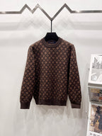 Long-sleeve crewneck sweater with dark monogram pattern, brown base