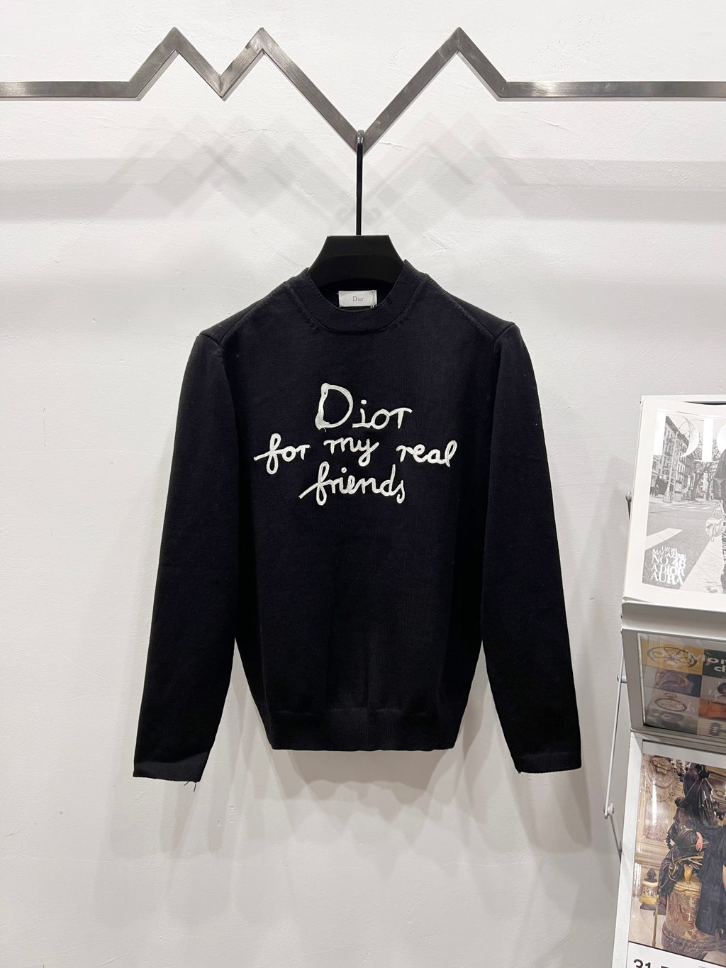 Black crewneck sweater with long sleeves and Dior friends graphic
