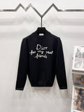 Black crewneck sweater with long sleeves and Dior friends graphic